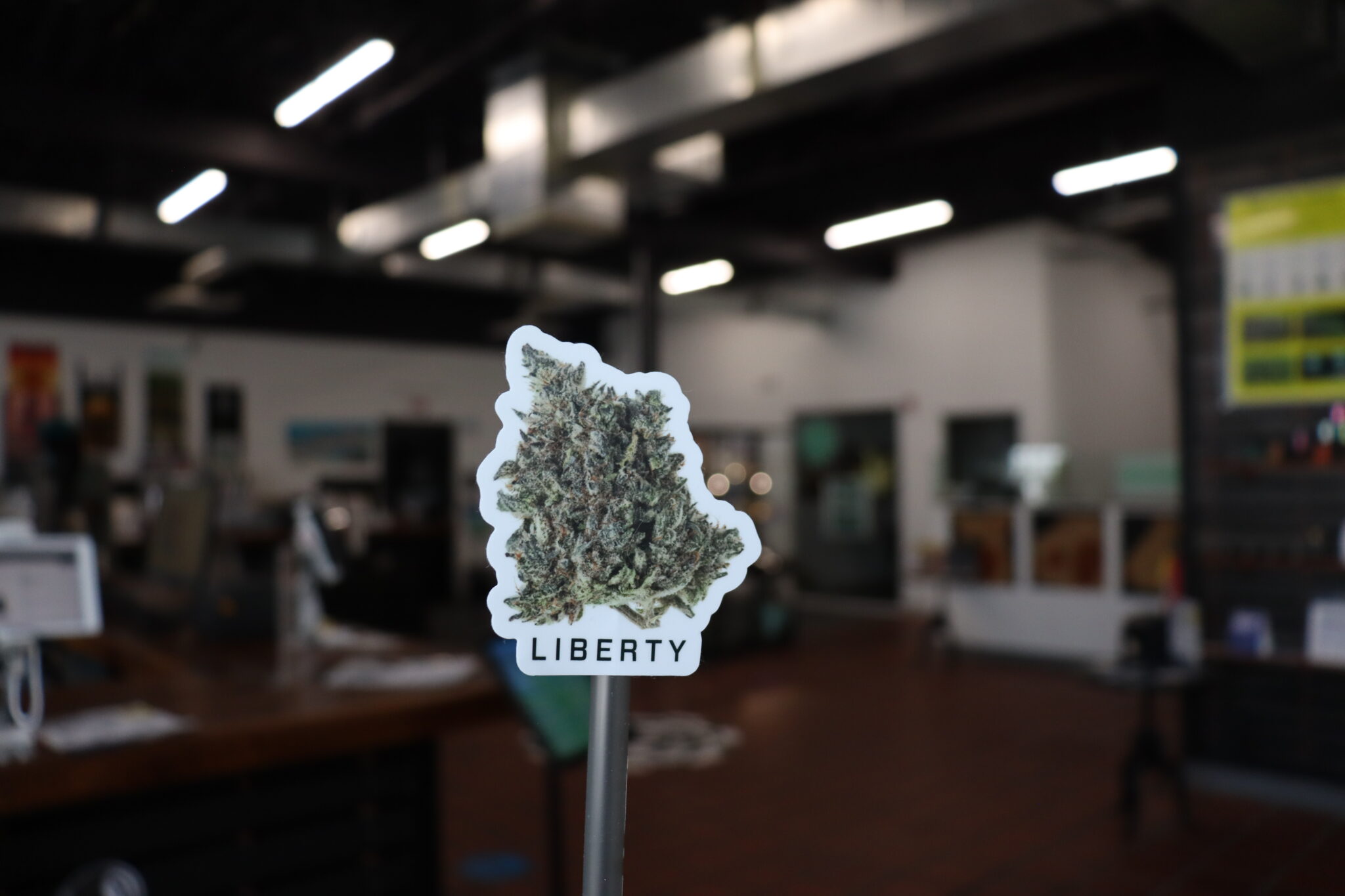 Cannabis flower signage in Liberty Baltimore dispensary