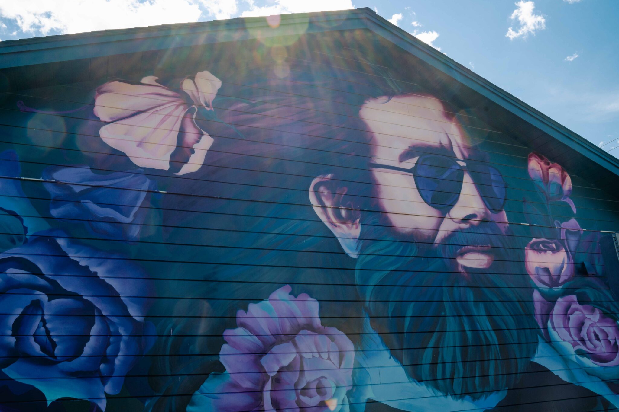 Liberty Easthampton dispensary exterior mural of Jerry Garcia