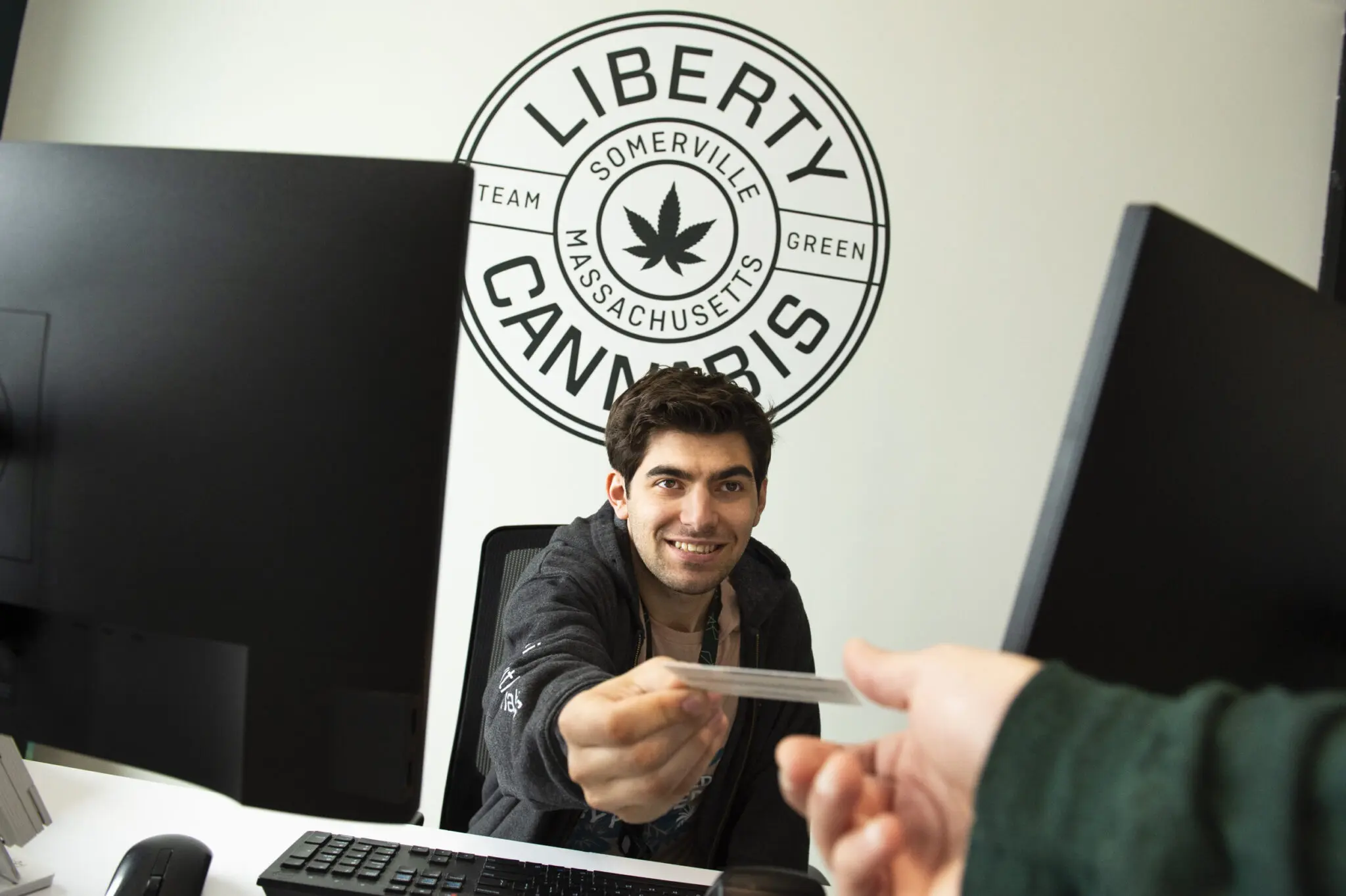 Liberty Somerville employee and customer at reception desk