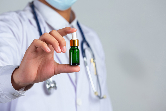 A doctor showcases cannabis oil